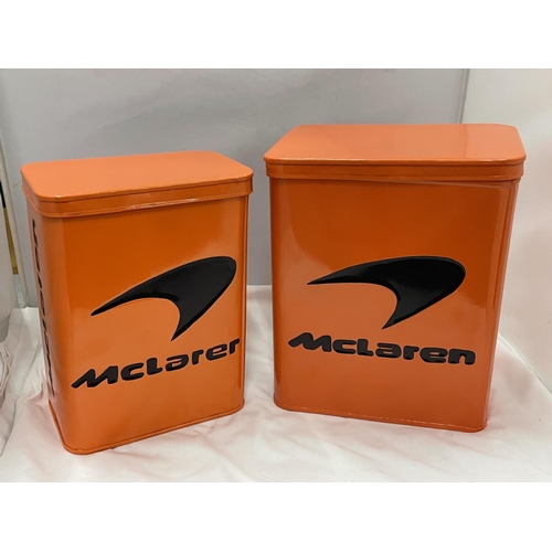 99 - TWO ORANGE McCLAREN STORAGE TINS