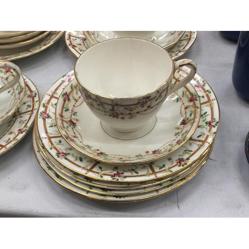 208 - A QUANTITY OF QUEEN'S CHINA CUPS, SAUCERS AND SIDE PLATES