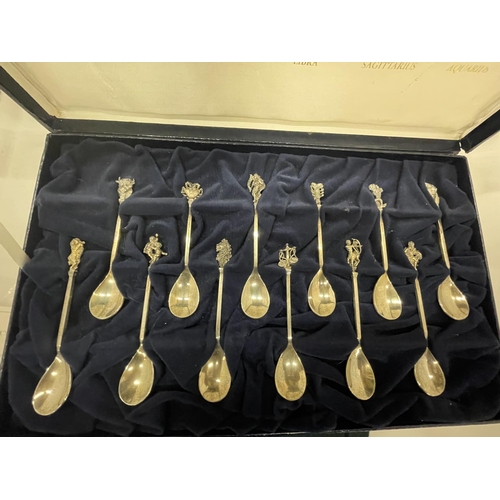 1 - A SET OF TWELVE STERLING SILVER AND SILVER GILT LIMITED EDITION FOR YEAR 1979 ASTROLOGICAL SPOONS IN... 