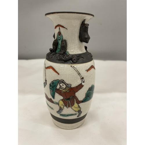 18 - A CRACKLE GLAZE CHINESE VASE DEPICTING WARRIORS IN BATTLE