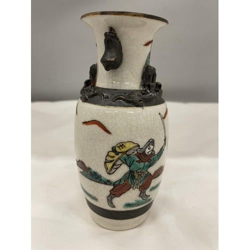 18 - A CRACKLE GLAZE CHINESE VASE DEPICTING WARRIORS IN BATTLE