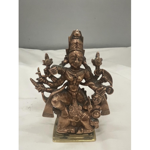 29 - A HEAVY BRASS AND COPPER MODEL OF THE GOD DURGA HEIGHT 13 CM