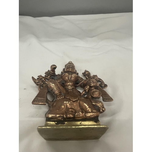 29 - A HEAVY BRASS AND COPPER MODEL OF THE GOD DURGA HEIGHT 13 CM