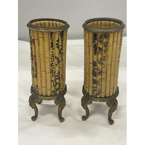 31 - A PAIR OF VINTAGE ORMOLU AND CERAMIC SPILL HOLDERS IN A BAMBOO DESIGN