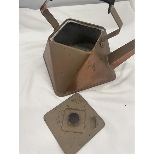 34 - AN ARTS AND CRAFTS CHRISTOPHER DRESSER INSPIRED  COPPER KETTLE OCTAGONAL SHAPE WITH BAKELITE HANDLES