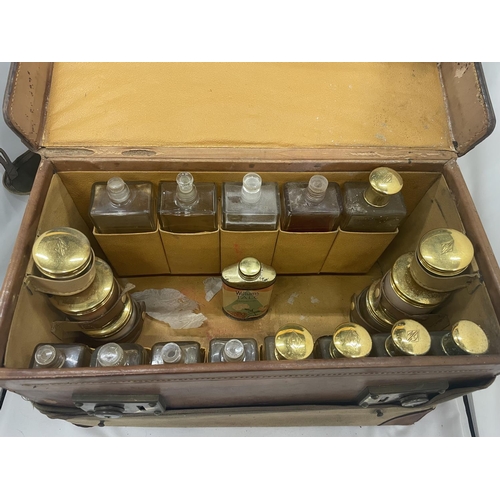 39 - A VINTAGE AUX ETATS UNIS 229 RUE ST HONORE PARIS VANITY/APOTHECARY CASE MONGRAMED ON COVER, CASE AND... 