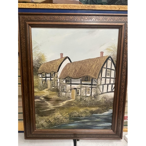 42 - A FRAMED OIL ON CANVAS OF A COUNTRY COTTAGE SIGNED PR FREEMAN