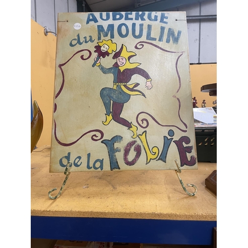 50A - A HANDPAINTED WOODEN SIGN AUBERGE DU MOULIN DE DE LA FOLIE ON AN EASELSIZE 62CM X 51CM