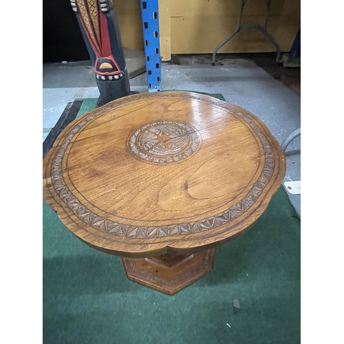 51 - A WOODEN SIDE TABLE