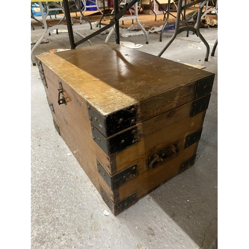 104 - A PINE SMALL CHEST WITH METAL BANDING AND HANDLES HEIGHT 34CM, WIDTH 54CM, DEPTH 34CM