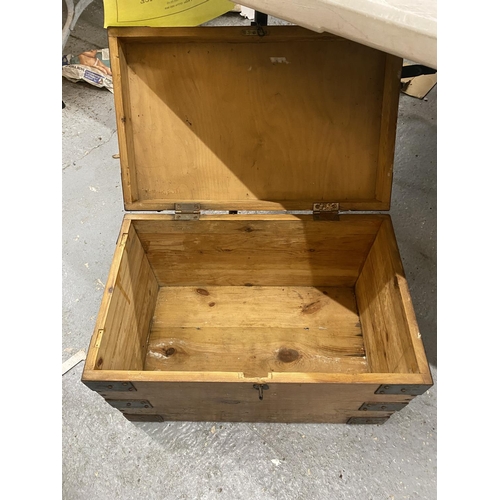 104 - A PINE SMALL CHEST WITH METAL BANDING AND HANDLES HEIGHT 34CM, WIDTH 54CM, DEPTH 34CM