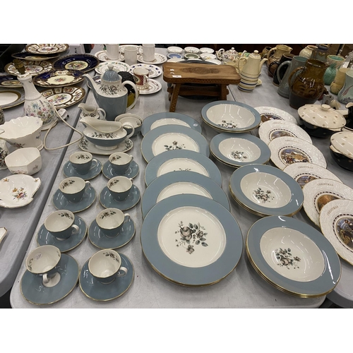 107 - A ROYAL DOULTON 'ROSE ELEGANS' PART DINNER SERVICE TO INCLUDE DINNER PLATES, SERVING BOWLS, DESSERT ... 