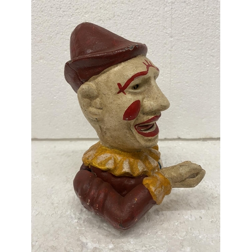 115 - A VINTAGE STYLE CAST CLOWN MONEY BOX