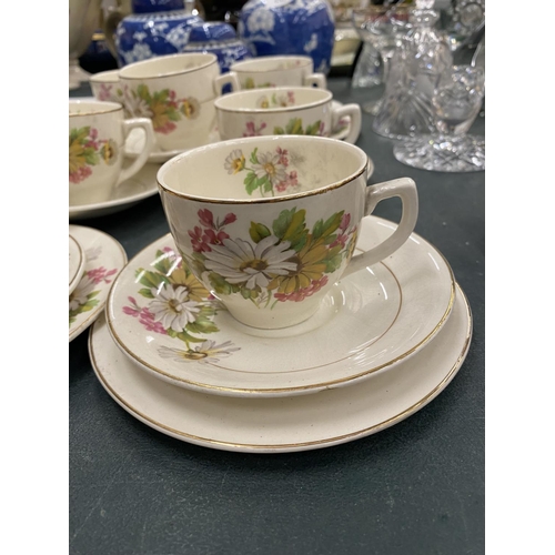 131 - A QUANTITY KIRKLANDS EMBASSY WARE TO INCLUDE FLORAL PATTERN CUPS, SAUCERS AND SIDE PLATES