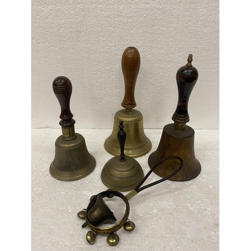 70 - A COLLECTION OF BRASS BELLS TO INCLUDE HAND BELLS, ETC