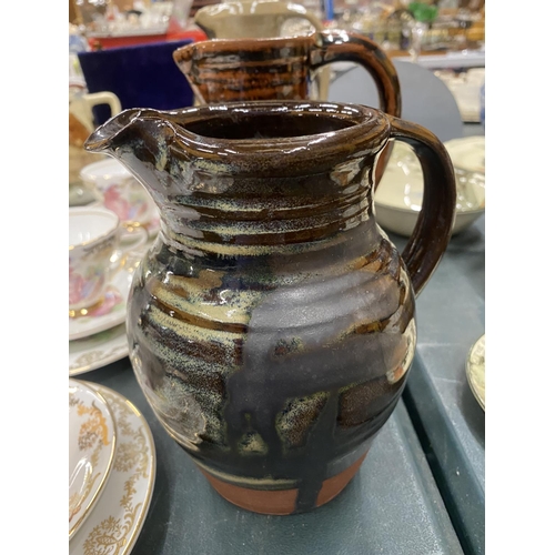 72 - FOUR STONEWARE STUDIO POTTERY JUGS