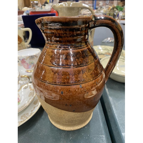 72 - FOUR STONEWARE STUDIO POTTERY JUGS