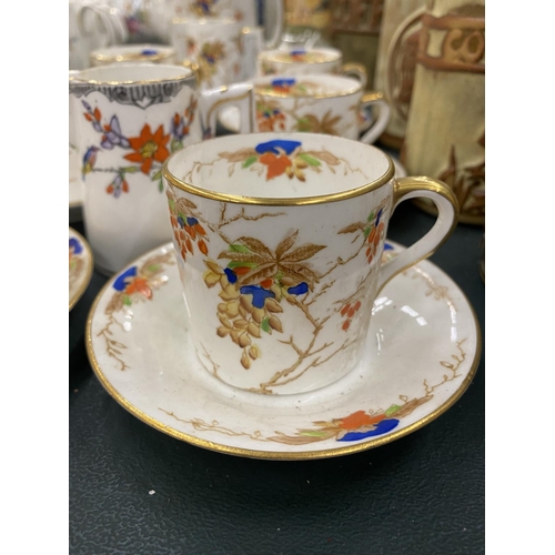 76 - A ROSINA CHINA COFFEE SET TO INCLUDE A COFFEE POT, CREAM JUGS, COFFEE CANS AND SAUCERS