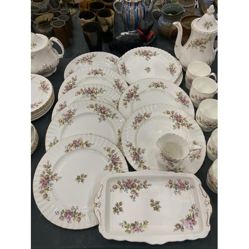 77 - A LARGE QUANTITY OF ROYAL ALBERT 'MOSS ROSE' TO INCLUDE A TEA AND COFFEE POT, CREAM JUG, DINNER AND ... 