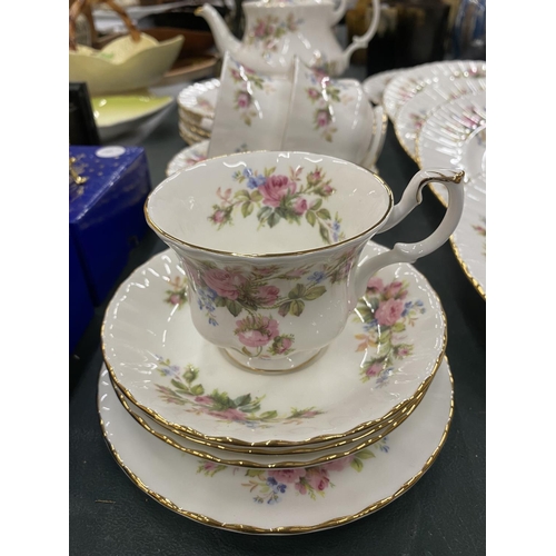 77 - A LARGE QUANTITY OF ROYAL ALBERT 'MOSS ROSE' TO INCLUDE A TEA AND COFFEE POT, CREAM JUG, DINNER AND ... 