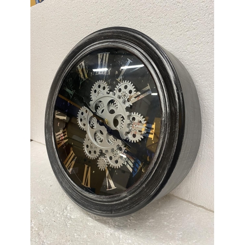 86 - A WALL CLOCK WITH MOVING COGS ON THE FACE DIAMETER  33CM