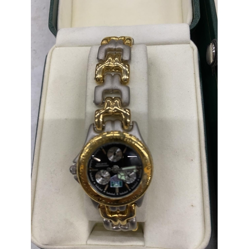 96 - TWO BOXED FASHION WATCHES