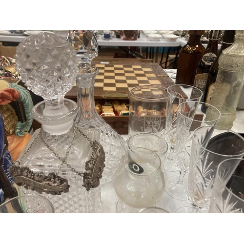 160 - A QUANTITY OF GLASSES TO INCLUDE TWO DECANTERS, DESSERT BOWLS, CHAMPAGNE FLUTES, SHERRY GLASSES, 'BA... 