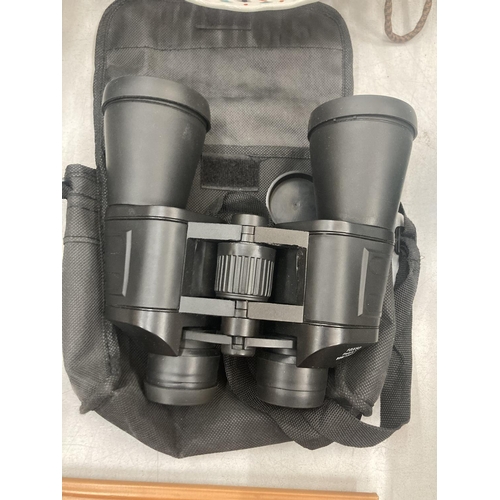 166 - A PAIR OF FIELD BINOCULARS IN A CASE