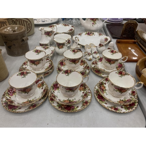 172 - A ROYAL ALBERT 'COUNTRY ROSES' TEASET TO INCLUDE A TEAPOT, SIX TRIOS, CREAM JUGS, SUGAR BOWL - SECON... 