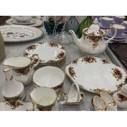 172 - A ROYAL ALBERT 'COUNTRY ROSES' TEASET TO INCLUDE A TEAPOT, SIX TRIOS, CREAM JUGS, SUGAR BOWL - SECON... 