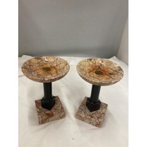 183 - A PAIR OF MARBLE STYLE CLOCK GARNITURES