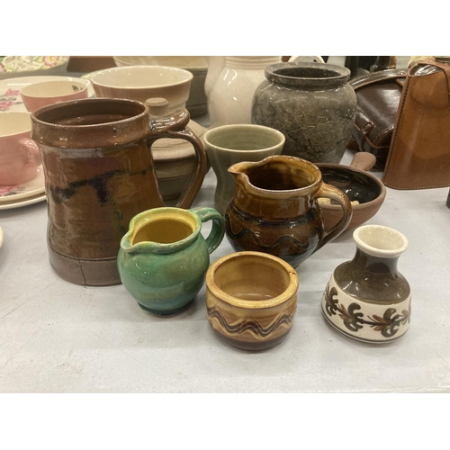 184 - A QUANTITY OF STUDIO POTTERY TO INCLUDE BOWLS, JUGS, POTS, ETC - SOME MARKED TO THE BASE