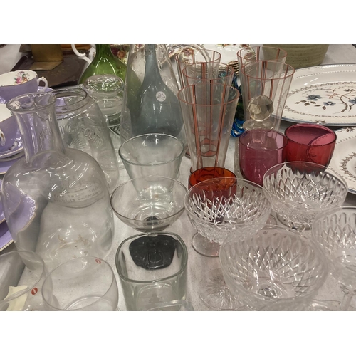 193 - A LARGE QUANTITY OF GLASSWARE TO INCLUDE COLOURED SLIM NECK VASES, A M'DINA STYLE BOWL, DARTINGTON C... 