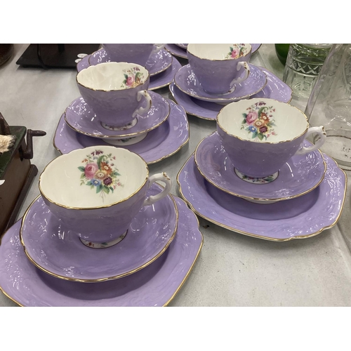 195 - SIX COALPORT PURPLE AND FLORAL TRIOS - ONE CUP A/F