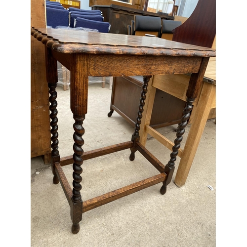 2397 - AN EARLY 20TH CENTURY OAK OCCASIONAL TABLE ON BARLEYTWIST LEGS, 23X16