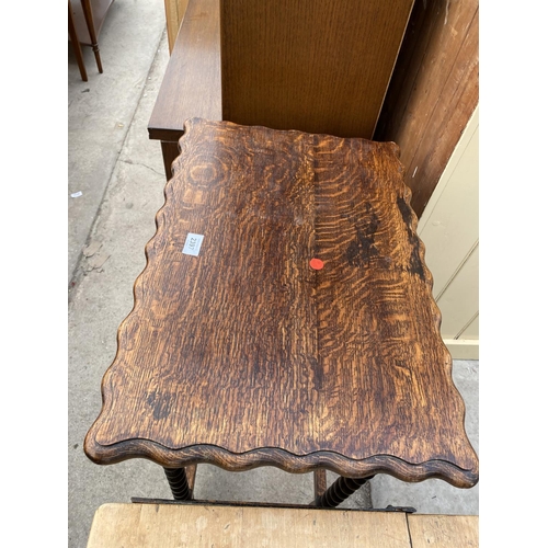 2397 - AN EARLY 20TH CENTURY OAK OCCASIONAL TABLE ON BARLEYTWIST LEGS, 23X16