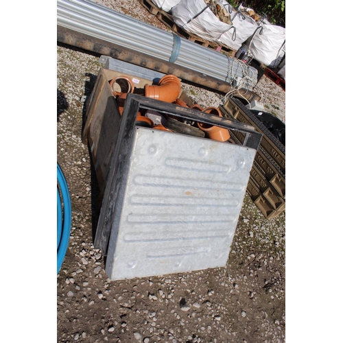 1105 - BOX OF 110MM DRAINAGE PIPE COUPLINGS, GRIDS ETC AND 2 NEW GALVANISED MANHOLES  NO VAT