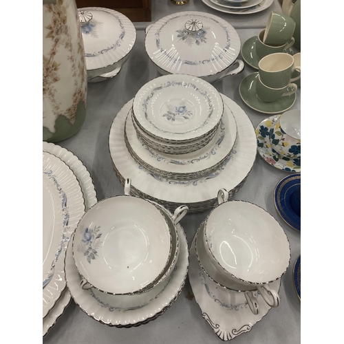 219 - A QUANTITY OF PARAGON CHINA 'MORNING ROSE' TO INCLUDE TUREENS, SERVING PLATES, BOWLS, CUPS, SAUCERS,... 