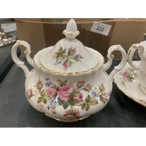 221 - A COLLECTION OF ROYAL ALBERT 'MOSS ROSE' TO INCLUDE CUPS AND SAUCERS, LIDDED SUGAR BOWL, SUGAR BOWL ... 