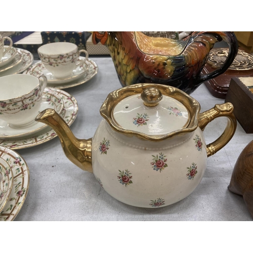 231 - FOUR COLLECTABLE TEAPOTS TO INCLUDE ARTHUR WOOD FLORAL AND GILT PATTERNED, A ROOSTER, MYOTT'S 'COUNT... 