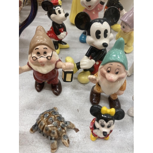 234 - A COLLECTION OF DISNEY FIGURES TO INCLUDE SNOW WHITE, MICKEY MOUSE AND MINNIE, PLUS WADE WHIMSIES, M... 