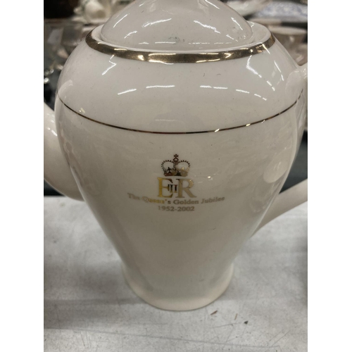 235 - A CREAM AND GILT TEAPOT AND CREAM JUG TO COMMEMORATE QUEEN ELIZABETH 11 GOLDEN JUBILEE