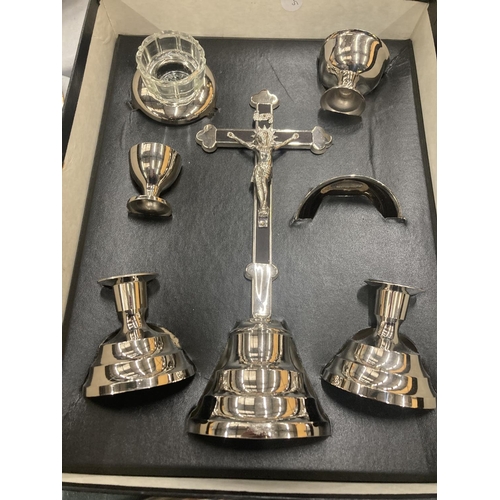 248 - A BOXED MOBILE STAINLESS STEEL HOLY COMMUNION SET