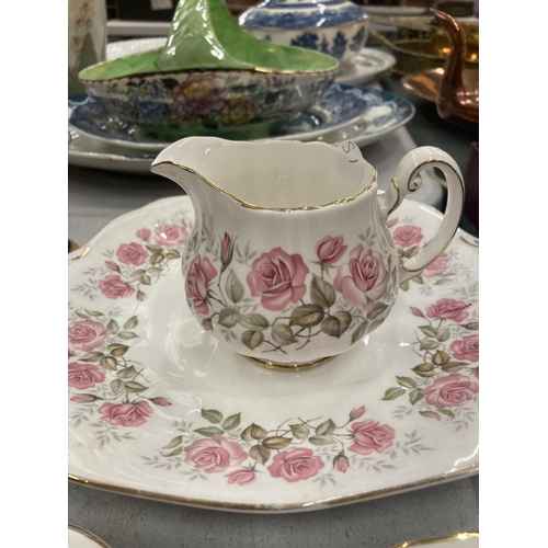 249 - A QUANTITY OF ROYAL ADDERLEY 'DEVONSHIRE ROSES' TO INCLUDE, A CAKE PLATE, CREAM JUG, CUPS AND SAUCER... 