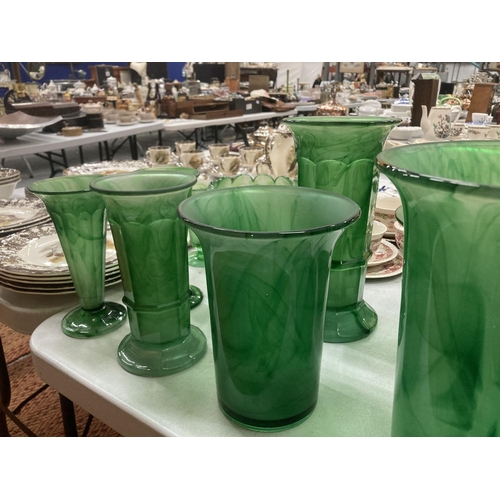 261 - A QUANTITY OF EMERALD GREEN CLOUD GLASS TO INCLUDE PLANTERS AND VASES