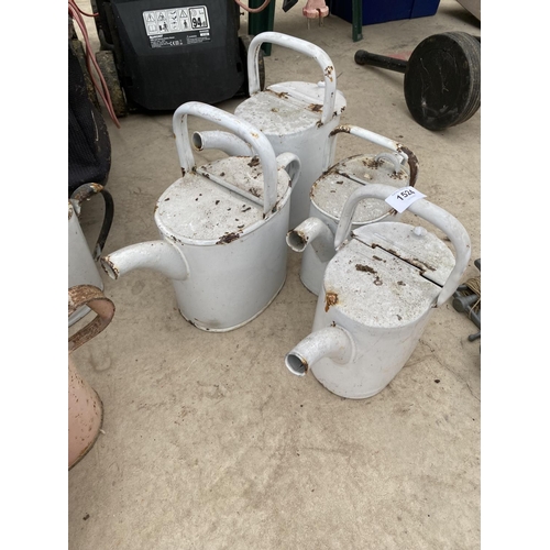 1524 - FOUR METAL WATERING CAN PLANTERS