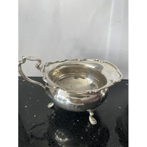 32A - TWO SILVER ITEMS TO INCLUDE A SUGAR BOWL AND CREAM JUG BOTH HALLMARKED SHEFFIELD 1911 GROSS WEIGHT 2... 