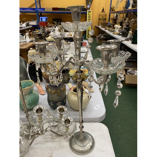 92 - A PAIR OF SILVER PLATED FOUR BRANCHED CANDLEABRAS WITH CRYSTAL DROPLETS - 1 A/F