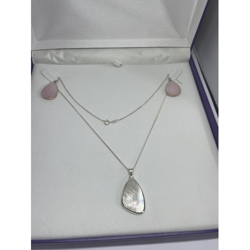 525 - A MARKED SILVER NECKLACE WITH PEARLISED PENDANT AND A PAIR OF SILVER EARRINGS WITH PINK PEARLISED DR... 