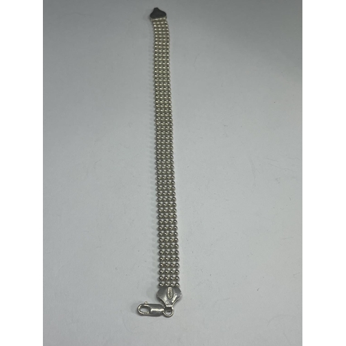 526 - A MARKED SILVER BRACELET IN A PRESENTATION BOX